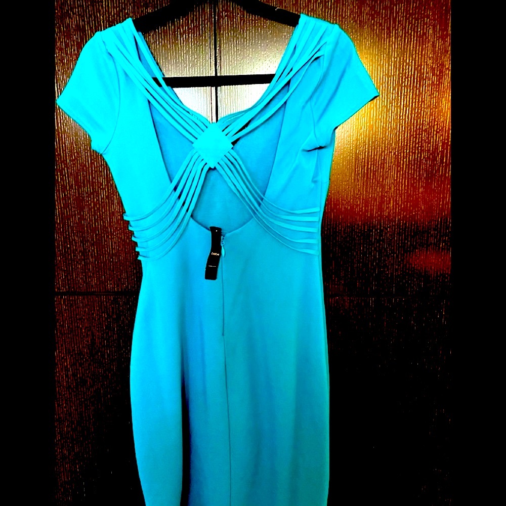 Blue cocktail dress with back detail. BEBE